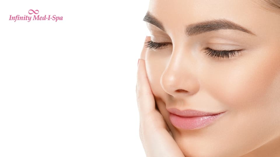 beautiful woman with hand on face top skincare trends